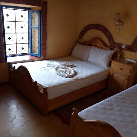 Les Pyramides Hotel Merzouga Bagian luar foto