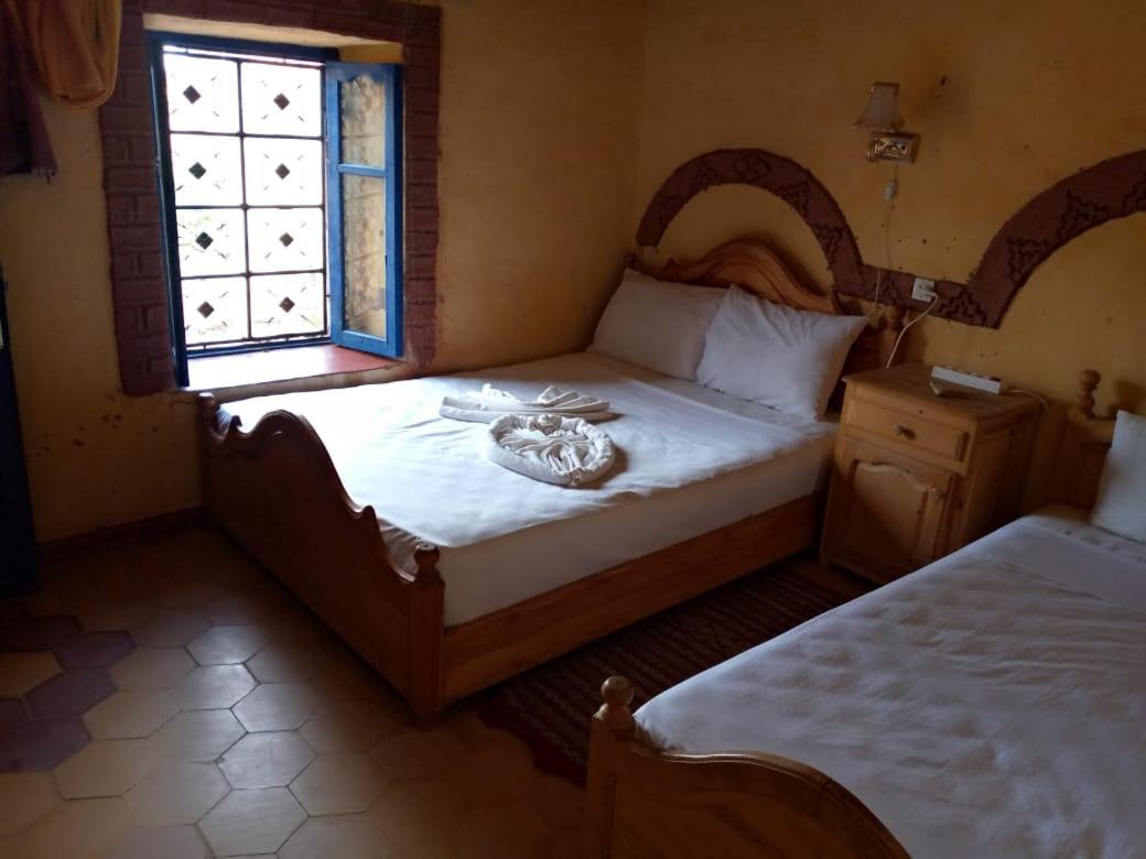 Les Pyramides Hotel Merzouga Bagian luar foto
